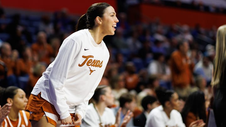 Jan 29, 2026; Gainesville, Florida, USA; Texas Longhorns guard Sarah Graves (6) celebrates from the bench against the Florida Gators.