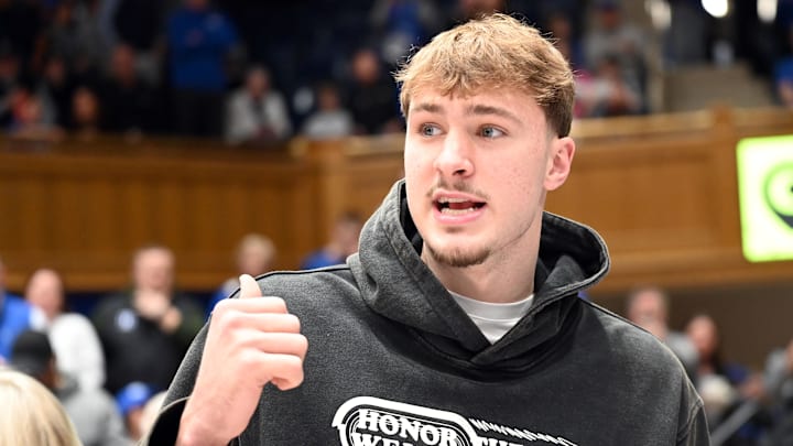 Feb 14, 2026; Durham, North Carolina, USA; Former Duke Blue Devils player Cooper Flagg looks on during the first half against the Clemson Tigers at Cameron Indoor Stadium. Feb 14, 2026; Durham, North Carolina, USA; Former Duke Blue Devils player Cooper Flagg looks on during the first half against the Clemson Tigers at Cameron Indoor Stadium.