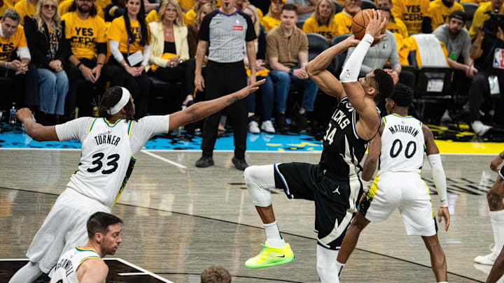 Apr 29, 2025; Indianapolis, Indiana, USA; Milwaukee Bucks forward Giannis Antetokounmpo (34) shoots the ball while  Indiana Pacers center Myles Turner (33) defends during game five of the first round for the 2024 NBA Playoffs at Gainbridge Fieldhouse. Mandatory Credit: Trevor Ruszkowski-Imagn Images