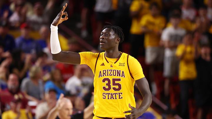 Mar 3, 2026; Tempe, Arizona, USA; Arizona State Sun Devils center Massamba Diop (35) celebrates a three pointer against the Kansas Jayhawks in the first half at Desert Financial Arena. Mar 3, 2026; Tempe, Arizona, USA; Arizona State Sun Devils center Massamba Diop (35) celebrates a three pointer against the Kansas Jayhawks in the first half at Desert Financial Arena.