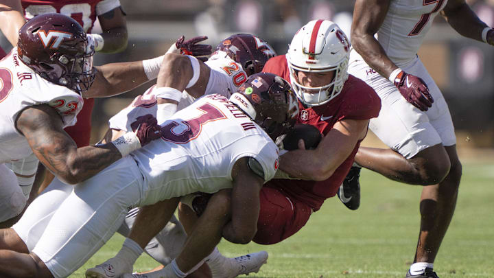 Oct 5, 2024; Stanford, California, USA; Virginia Tech Hokies linebacker Sam Brumfield (3) sacks Stanford Cardinal quarterback Justin Lamson (8) during the third quarter at Stanford Stadium. Mandatory Credit: Stan Szeto-Imagn Images Oct 5, 2024; Stanford, California, USA; Virginia Tech Hokies linebacker Sam Brumfield (3) sacks Stanford Cardinal quarterback Justin Lamson (8) during the third quarter at Stanford Stadium. Mandatory Credit: Stan Szeto-Imagn Images