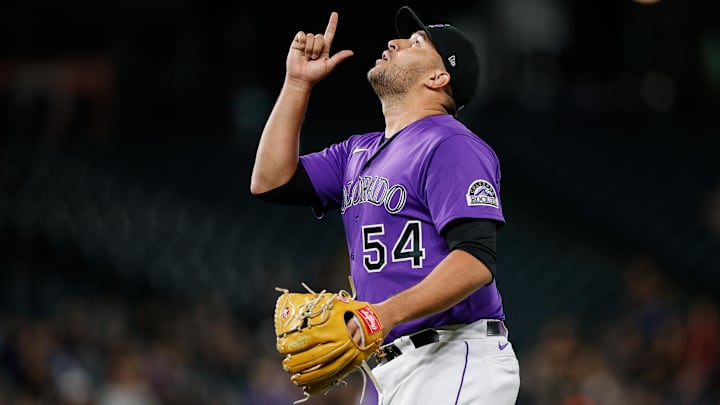 Sep 28, 2021; Denver, Colorado, USA; Colorado Rockies relief pitcher Carlos Estevez (54) reacts
