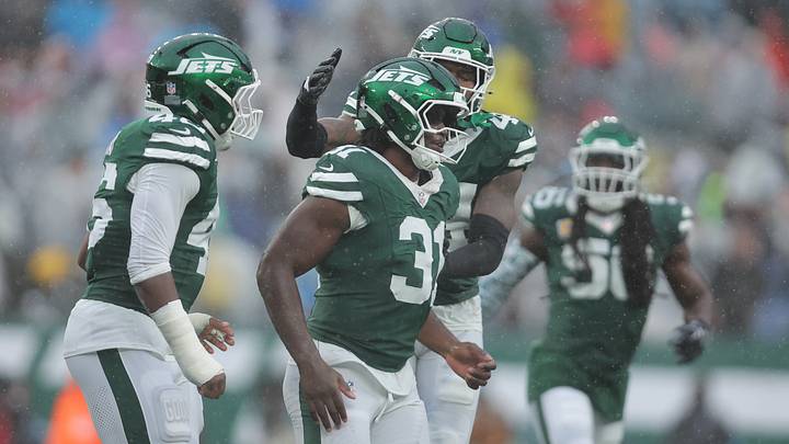 Oct 11, 2026; East Rutherford, New Jersey, USA;  New York Jets linebacker Jamien Sherwood (44) and New York Jets defensive end Joseph Ossai (46) celebrate with defensive end David Bailey (31) after a sack against the Cleveland Browns during the second half at MetLife Stadium.  
