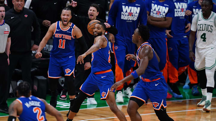 New York Knicks forward Bridges (25) reacts after stripping the ball from Boston Celtics guard Brown winning the game in overtime during game one of the second round for the 2025 NBA Playoffs at TD Garden. 