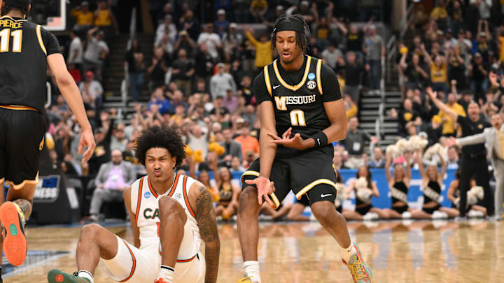Mar 20, 2026; St. Louis, MO, USA; Missouri Tigers guard Anthony Robinson II (0) reacts after shooting a three pointer during the second half against the Miami (FL) Hurricanes during a first round game of the men's 2026 NCAA Tournament at Enterprise Center. Mandatory Credit: Jeff Curry-Imagn Images Mar 20, 2026; St. Louis, MO, USA; Missouri Tigers guard Anthony Robinson II (0) reacts after shooting a three pointer during the second half against the Miami (FL) Hurricanes during a first round game of the men's 2026 NCAA Tournament at Enterprise Center. Mandatory Credit: Jeff Curry-Imagn Images