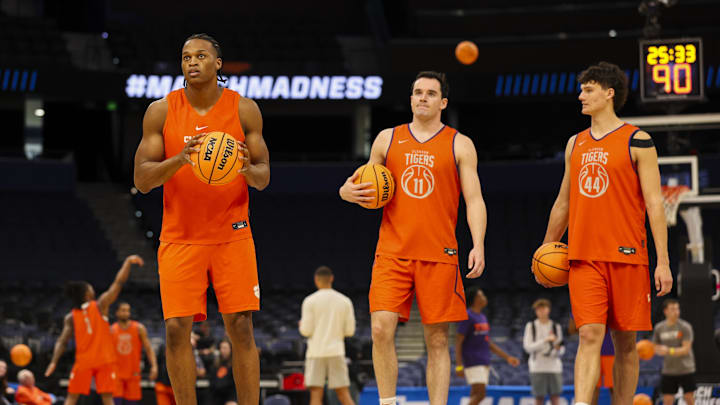 Mar 19, 2026; Tampa, FL, USA; Clemson Tigers forward RJ Godfrey (0) forward Nick Davidson (11) and center Trent Steinour (44) participate in a practice session ahead of the first round of the men's 2026 NCAA Tournament at Benchmark International Arena. Mandatory Credit: Nathan Ray Seebeck-Imagn Images Mar 19, 2026; Tampa, FL, USA; Clemson Tigers forward RJ Godfrey (0) forward Nick Davidson (11) and center Trent Steinour (44) participate in a practice session ahead of the first round of the men's 2026 NCAA Tournament at Benchmark International Arena. Mandatory Credit: Nathan Ray Seebeck-Imagn Images