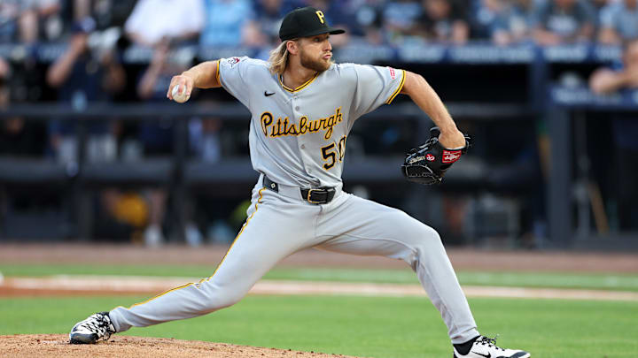 Mar 31, 2025; St. Petersburg, Florida, USA; Pittsburgh Pirates pitcher Carmen Mlodzinski (50) throws a pitch against the Tampa Bay Rays in the first inning at George M. Steinbrenner Field. Mandatory Credit: Nathan Ray Seebeck-Imagn Images