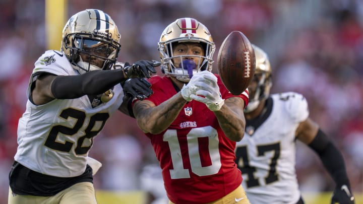 San Francisco 49ers wide receiver Ronnie Bell (10) misses a catch defended by New Orleans Saints cornerback Rejzohn Wright (28)