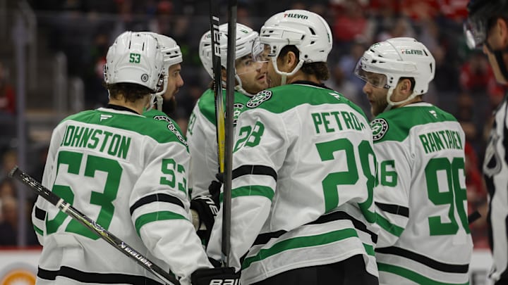 Apr 14, 2025; Detroit, Michigan, USA; The Dallas Stars celebrate a goal in the first period against the Detroit Red Wings at Little Caesars Arena. Mandatory Credit: Brian Bradshaw Sevald-Imagn Images