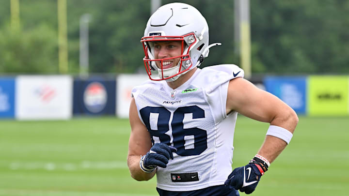 Jun 9, 2025; Foxborough, MA, USA; New England Patriots wide receiver Efton Chism III (86) reacts after completing a drill during minicamp at Gillette Stadium.