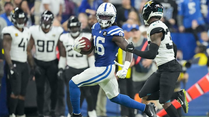 Indianapolis Colts wide receiver Ashton Dulin (16) works to move past Jacksonville Jaguars cornerback Montaric Brown (30) on a kickoff return Sunday, Dec. 28, 2025, during a game at Lucas Oil Stadium in Indianapolis.