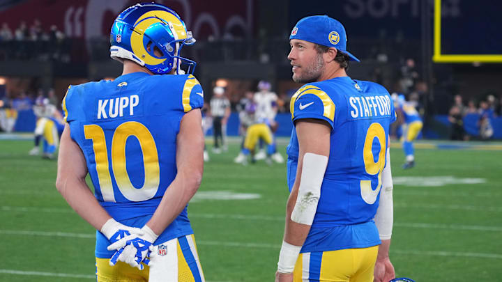 Jan 13, 2025; Glendale, AZ, USA; Los Angeles Rams quarterback Matthew Stafford (9) and wide receiver Cooper Kupp (10) watch from the sidelines against the Minnesota Vikings during the second half in an NFC wild card game at State Farm Stadium. Jan 13, 2025; Glendale, AZ, USA; Los Angeles Rams quarterback Matthew Stafford (9) and wide receiver Cooper Kupp (10) watch from the sidelines against the Minnesota Vikings during the second half in an NFC wild card game at State Farm Stadium.