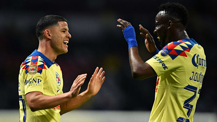 Richard Sánchez (left) and Julián Quiñones – the goal-scorers for América – celebrate after the former's goal against Querétaro in Liga MX action at Estadio Azteca.