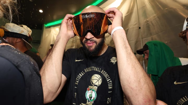 Jun 17, 2024; Boston, Massachusetts, USA; Boston Celtics guard Derrick White (9) celebrates in the locker room after winning the 2024 NBA Finals against the Dallas Mavericks at TD Garden. Mandatory Credit: Elsa/Pool Photo-USA TODAY Sports