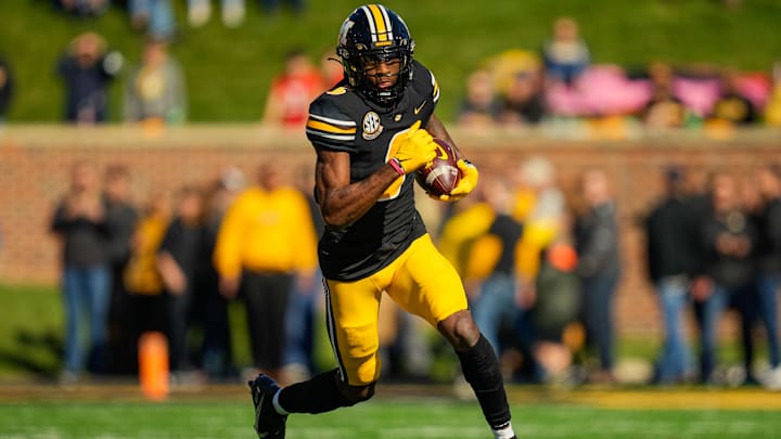 Oct 16, 2021; Columbia, Missouri, USA; Missouri Tigers wide receiver Keke Chism (6) runs against the Texas A&M Aggies during the first half at Faurot Field at Memorial Stadium. Mandatory Credit: Jay Biggerstaff-Imagn Images