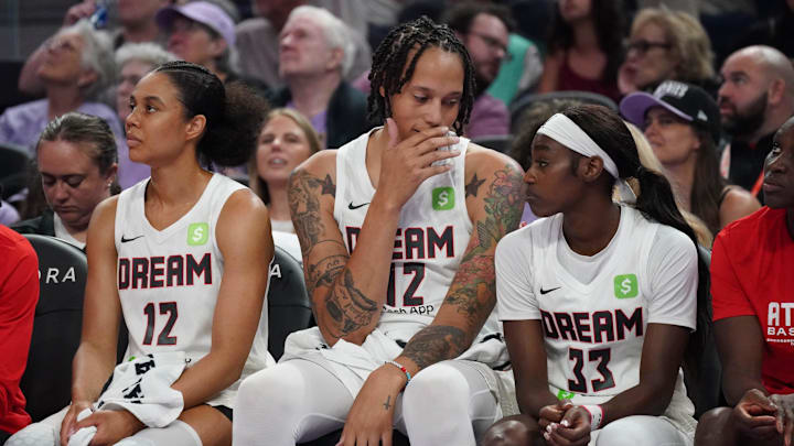 Aug 17, 2025; San Francisco, California, USA; Atlanta Dream forward Nia Coffey (12), center Brittney Griner (42), and guard Maya Caldwell (33) sit on the bench in the second quarter during a game against the Golden State Valkyries at Chase Center. Mandatory Credit: David Gonzales-Imagn Images Aug 17, 2025; San Francisco, California, USA; Atlanta Dream forward Nia Coffey (12), center Brittney Griner (42), and guard Maya Caldwell (33) sit on the bench in the second quarter during a game against the Golden State Valkyries at Chase Center. Mandatory Credit: David Gonzales-Imagn Images