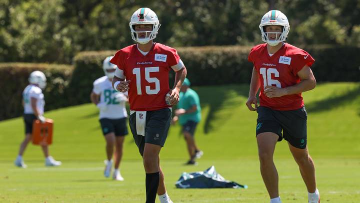 Miami Dolphins quarterback Cam Miller (15) and quarterback Mark Gronowski (16) work during rookie minicamp at the Baptist Health Training Complex. Miami Dolphins quarterback Cam Miller (15) and quarterback Mark Gronowski (16) work during rookie minicamp at the Baptist Health Training Complex.