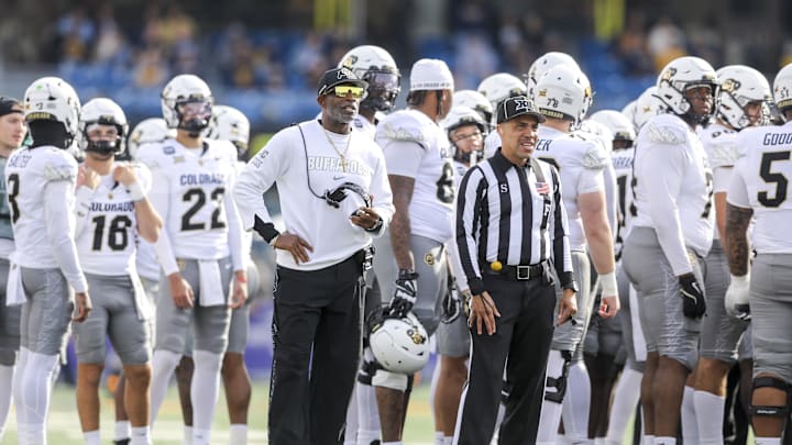 Nov 8, 2025; Morgantown, West Virginia, USA; Colorado Buffaloes head coach Deion Sanders watches the big screen during a replay during the first quarter against the West Virginia Mountaineers at Milan Puskar Stadium. Mandatory Credit: Ben Queen-Imagn Images Nov 8, 2025; Morgantown, West Virginia, USA; Colorado Buffaloes head coach Deion Sanders watches the big screen during a replay during the first quarter against the West Virginia Mountaineers at Milan Puskar Stadium. Mandatory Credit: Ben Queen-Imagn Images