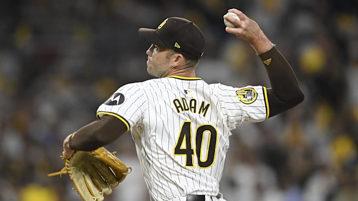 Oct 1, 2024; San Diego, California, USA; San Diego Padres pitcher Jason Adam (40) throws a pitch against the Atlanta Braves during the eighth inning in game one of the Wildcard round for the 2024 MLB Playoffs at Petco Park.