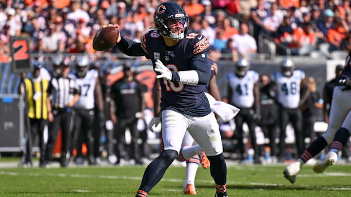 Oct 6, 2024; Chicago, Illinois, USA; Chicago Bears quarterback Caleb Williams (18) passes the ball against the Carolina Panthers during the third quarter at Soldier Field. Mandatory Credit: Daniel Bartel-Imagn Images