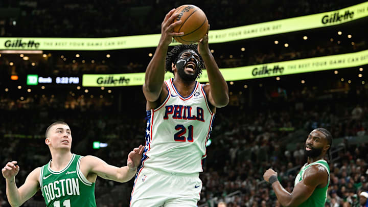 Dec 25, 2024; Boston, Massachusetts, USA; Philadelphia 76ers center Joel Embiid (21) shoots through the defense of Boston Celtics guard Payton Pritchard (11) during the first half at TD Garden. Mandatory Credit: Eric Canha-Imagn Images Dec 25, 2024; Boston, Massachusetts, USA; Philadelphia 76ers center Joel Embiid (21) shoots through the defense of Boston Celtics guard Payton Pritchard (11) during the first half at TD Garden. Mandatory Credit: Eric Canha-Imagn Images