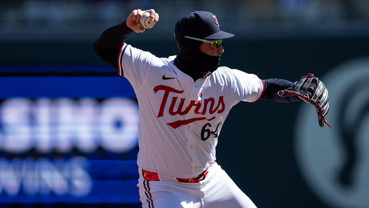 Apr 5, 2025; Minneapolis, Minnesota, USA; Minnesota Twins third baseman Jose Miranda (64) throws to first base for the out during the third inning against the Houston Astros at Target Field. Mandatory Credit: Jordan Johnson-Imagn Images