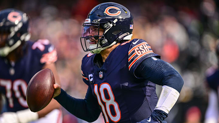 Nov 17, 2024; Chicago, Illinois, USA; Chicago Bears quarterback Caleb Williams (18) runs the ball against the Green Bay Packers during the first quarter at Soldier Field.