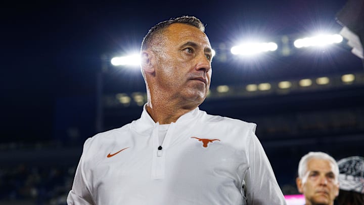 Texas Longhorns head coach Steve Sarkisian is interviewed by the media after the game against the Kentucky Wildcats at Kroger Field. Texas Longhorns head coach Steve Sarkisian is interviewed by the media after the game against the Kentucky Wildcats at Kroger Field.
