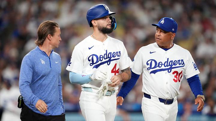 Aug 21, 2026; Los Angeles, California, USA; Los Angeles Dodgers center fielder Andy Pages (44) walks with head athletic trainer Thomas Albert (left) and manager Dave Roberts (30) after being hit by a pitch in the third inning against the Pittsburgh Pirates at Dodger Stadium. Mandatory Credit: Kirby Lee-Imagn Images Aug 21, 2026; Los Angeles, California, USA; Los Angeles Dodgers center fielder Andy Pages (44) walks with head athletic trainer Thomas Albert (left) and manager Dave Roberts (30) after being hit by a pitch in the third inning against the Pittsburgh Pirates at Dodger Stadium. Mandatory Credit: Kirby Lee-Imagn Images