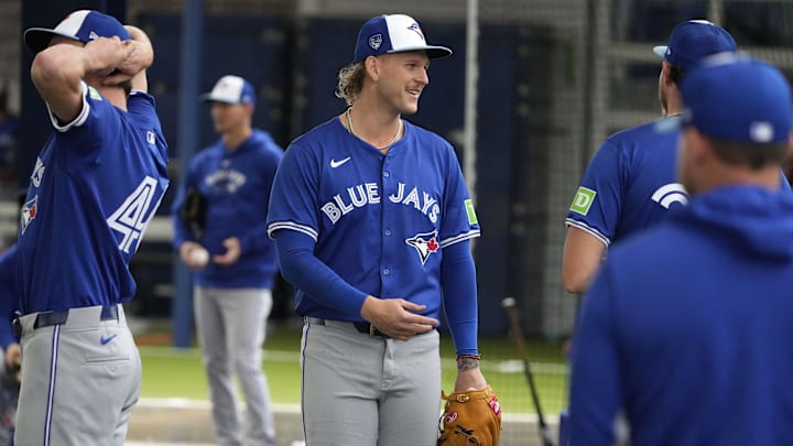 Feb 18, 2024; Dunedin, FL, USA;  Toronto Blue Jays pitcher Bowden Francis (44) warms up during