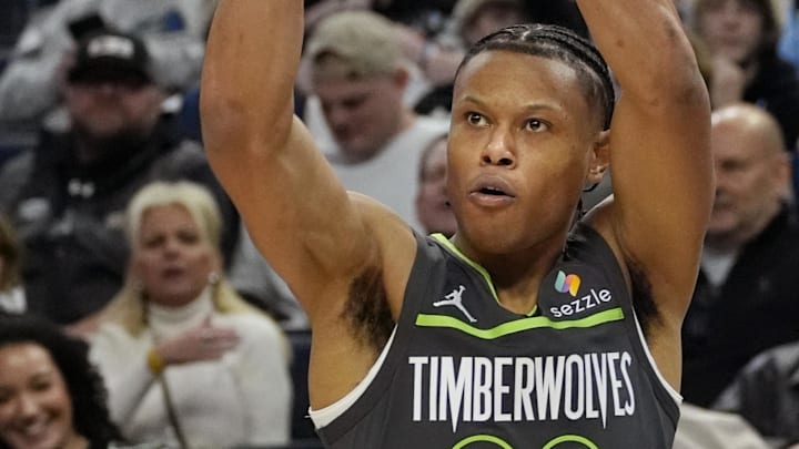 Feb 1, 2025; Minneapolis, Minnesota, USA; Minnesota Timberwolves guard Jaylen Clark (22) shoots against the Washington Wizards in the third quarter at Target Center. Mandatory Credit: Bruce Kluckhohn-Imagn Images