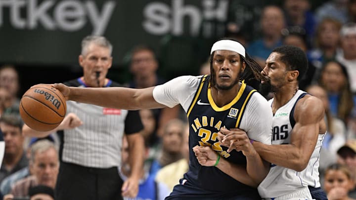 Nov 4, 2024; Dallas, Texas, USA; Indiana Pacers center Myles Turner (33) looks to move to the basket past Dallas Mavericks guard Spencer Dinwiddie (26) during the second half at the American Airlines Center. Mandatory Credit: Jerome Miron-Imagn Images
