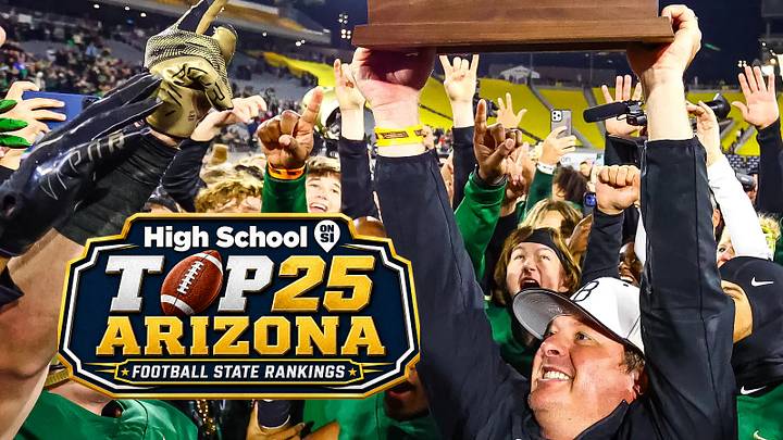 Basha head coach Chris McDonald holds up the 2025 Open Division Championship trophy. Basha head coach Chris McDonald holds up the 2025 Open Division Championship trophy.
