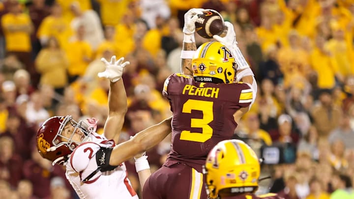 Oct 5, 2024; Minneapolis, Minnesota, USA; Minnesota Golden Gophers defensive back Koi Perich (3) intercepts a pass during the second half against the USC Trojans at Huntington Bank Stadium. Mandatory Credit: Matt Krohn-Imagn Images