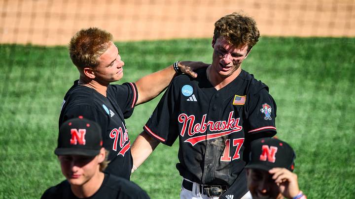 Will Jesske (left) consoles a teary Mac Moyer (17) after the game. Will Jesske (left) consoles a teary Mac Moyer (17) after the game.
