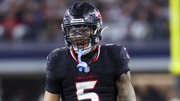 Nov 18, 2024; Arlington, Texas, USA; Houston Texans safety Jalen Pitre (5) reacts during the second half against the Dallas Cowboys at AT&T Stadium. Mandatory Credit: Kevin Jairaj-Imagn Images