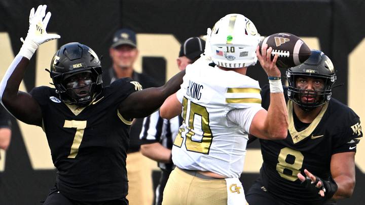 Wake Forest defensive linemen Nuer Gatkuoth (7) and defensive lineman Jayden Loving (8). Wake Forest defensive linemen Nuer Gatkuoth (7) and defensive lineman Jayden Loving (8).