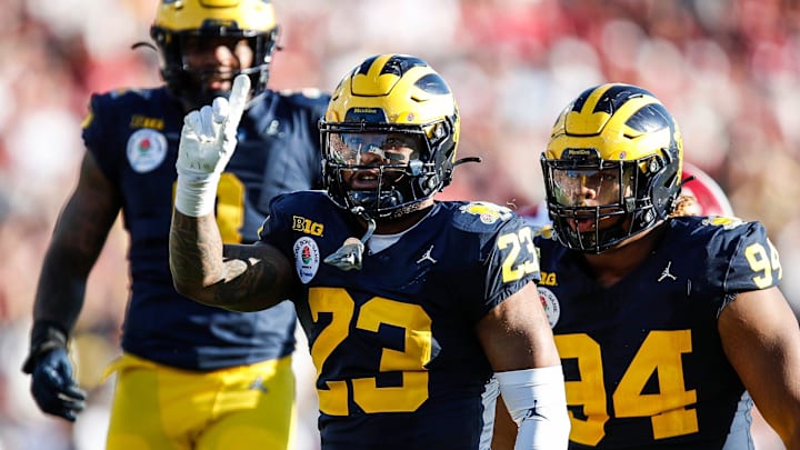Michigan linebacker Michael Barrett celebrates