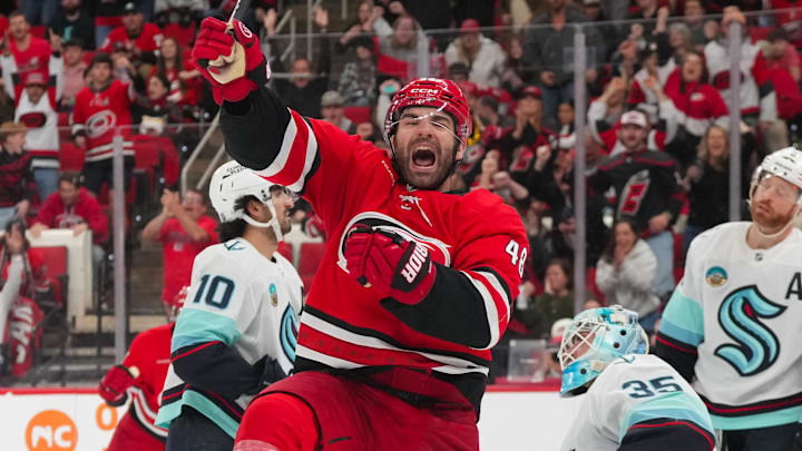 Jan 10, 2026; Raleigh, North Carolina, USA; Carolina Hurricanes left wing Jordan Martinook (48) scores a goal against the Seattle Kraken during the third period at Lenovo Center. Mandatory Credit: James Guillory-Imagn Images Jan 10, 2026; Raleigh, North Carolina, USA; Carolina Hurricanes left wing Jordan Martinook (48) scores a goal against the Seattle Kraken during the third period at Lenovo Center. Mandatory Credit: James Guillory-Imagn Images