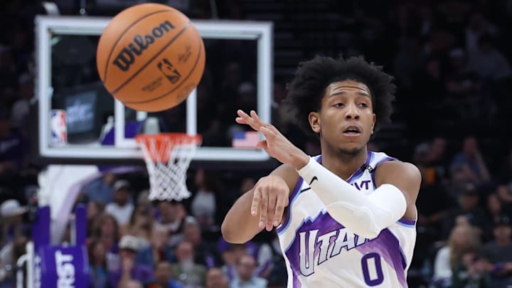 Mar 21, 2026; Salt Lake City, Utah, USA; Utah Jazz guard Kennedy Chandler (0) passes the ball against the Philadelphia 76ers during the second half at Delta Center. Mandatory Credit: Rob Gray-Imagn Images