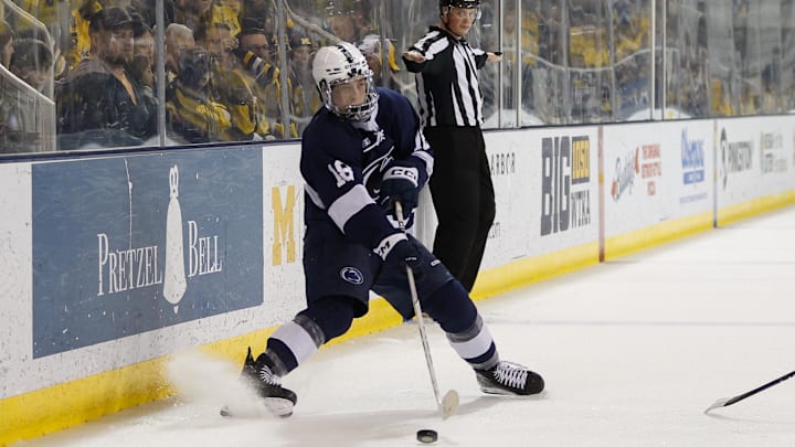 Penn State forward Aiden Fink handles the puck during the second period against the Michigan Wolverines at Yost Ice Arena. 