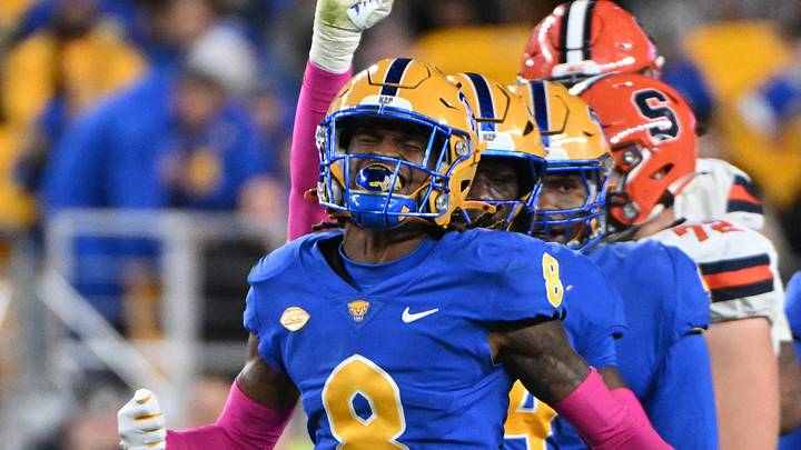Oct 24, 2024; Pittsburgh, Pennsylvania, USA; Pittsburgh Panthers defensive back Tamon Lynum (8) celebrates a tackle of Syracuse Orange running back LeQuint Allen (1) during the third quarter at Acrisure Stadium. Mandatory Credit: Barry Reeger-Imagn Images Oct 24, 2024; Pittsburgh, Pennsylvania, USA; Pittsburgh Panthers defensive back Tamon Lynum (8) celebrates a tackle of Syracuse Orange running back LeQuint Allen (1) during the third quarter at Acrisure Stadium. Mandatory Credit: Barry Reeger-Imagn Images