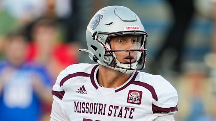 Sep 1, 2023; Lawrence, Kansas, USA; Missouri State Bears quarterback Jacob Clark (12) during the first half against the Kansas Jayhawks at David Booth Kansas Memorial Stadium. Mandatory Credit: Jay Biggerstaff-Imagn Images