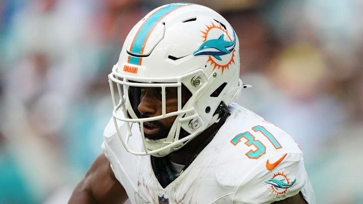 Nov 19, 2023; Miami Gardens, Florida, USA; Miami Dolphins running back Raheem Mostert (31) runs the ball against the Las Vegas Raiders during the second half at Hard Rock Stadium. Mandatory Credit: Jasen Vinlove-Imagn Images