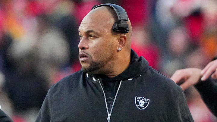 Nov 29, 2024; Kansas City, Missouri, USA; Las Vegas Raiders head coach Antonio Pierce watches play against the Kansas City Chiefs during the second half at GEHA Field at Arrowhead Stadium. Mandatory Credit: Denny Medley-Imagn Images