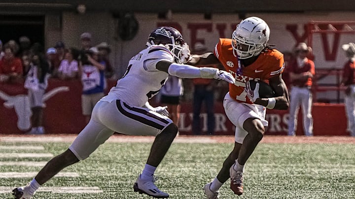 Texas Longhorns receiver Isaiah Bond (7) runs the ball during the game against Mississippi State at Darrell K Royal-Texas Memorial Stadium in Austin Saturday, Sept. 28, 2024.