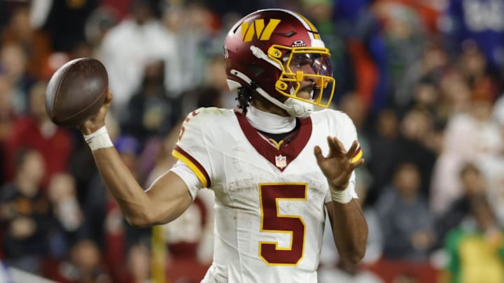 Nov 2, 2025; Landover, Maryland, USA; Washington Commanders quarterback Jayden Daniels (5) passes the ball during the second half against the Seattle Seahawks at Northwest Stadium.