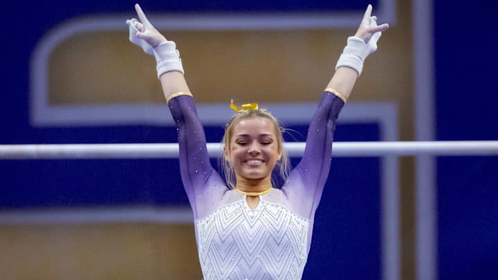 LSU Lady Tigers senior Livvy Dunne performs a demonstration uneven bars routine against the Arkansas Razorbacks. LSU Lady Tigers senior Livvy Dunne performs a demonstration uneven bars routine against the Arkansas Razorbacks.