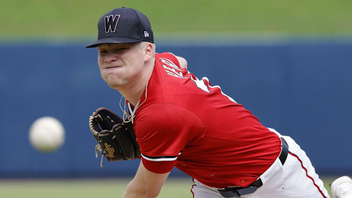 Feb 26, 2025; West Palm Beach, Florida, USA; Washington Nationals pitcher DJ Herz (77) throws a pitch before the first inning against the Houston Astros at CACTI Park of the Palm Beaches. Feb 26, 2025; West Palm Beach, Florida, USA; Washington Nationals pitcher DJ Herz (77) throws a pitch before the first inning against the Houston Astros at CACTI Park of the Palm Beaches.