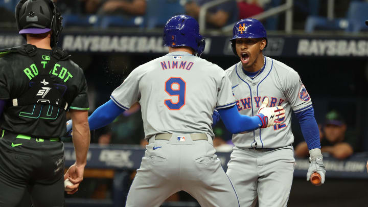 May 4, 2024; St. Petersburg, Florida, USA; New York Mets outfielder Brandon Nimmo (9) is congratulated by shortstop Francisco Lindor (12) after he scored against the Tampa Bay Rays during the first inning at Tropicana Field. Mandatory Credit: Kim Klement Neitzel-USA TODAY Sports May 4, 2024; St. Petersburg, Florida, USA; New York Mets outfielder Brandon Nimmo (9) is congratulated by shortstop Francisco Lindor (12) after he scored against the Tampa Bay Rays during the first inning at Tropicana Field. Mandatory Credit: Kim Klement Neitzel-USA TODAY Sports